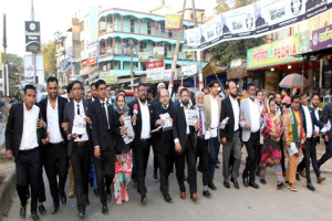 মুক্তাদির ও এমরান চৌধুরীর সমর্থনে  লিফলেট বিতরণ ও প্রচার মিছিল